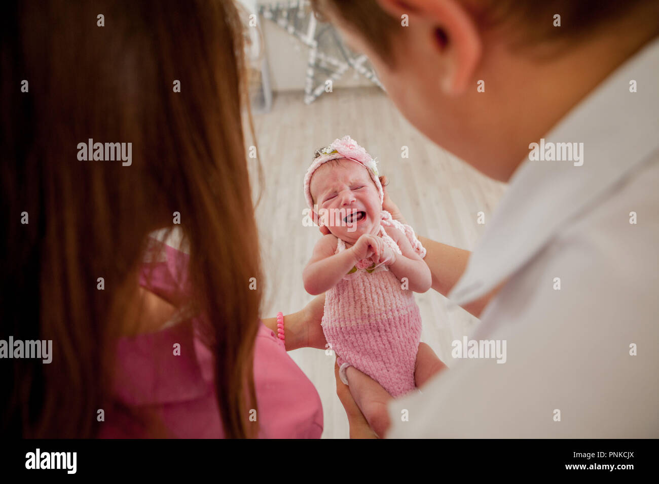 Young Couple With Cute Little Baby Smiling Mother And Father