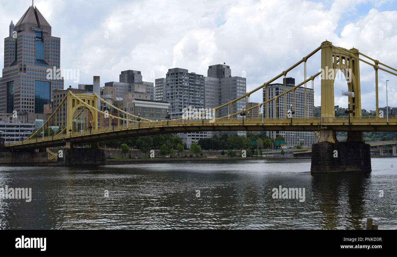 Roberto Clemente Bridge crossing the Allegheny River with downtown Pittsburgh and the Highmark Building in the background. Stock Photo