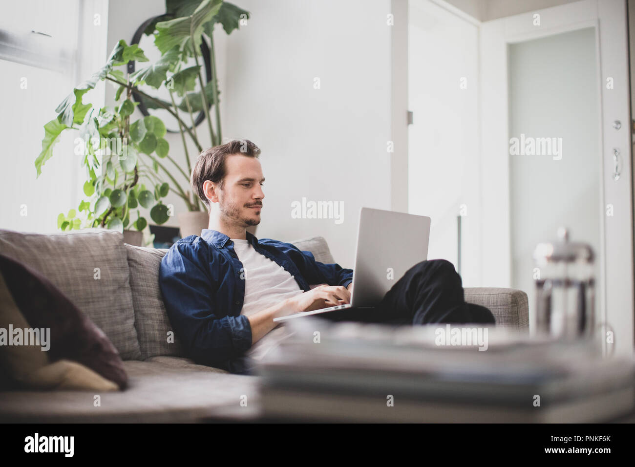 Businessman working laptop in home hi-res stock photography and images ...