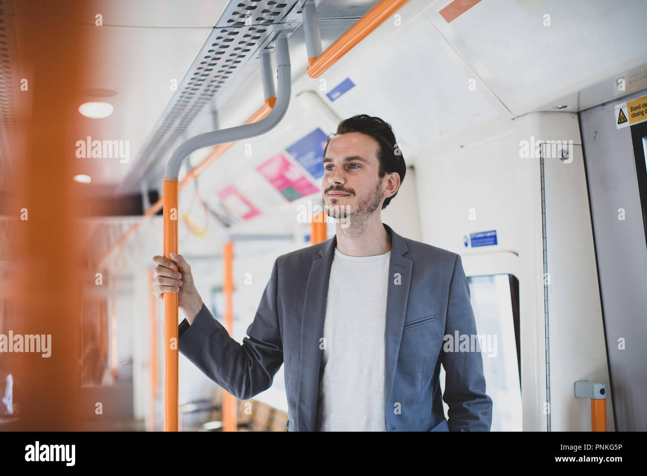 Commuter about to depart train Stock Photo