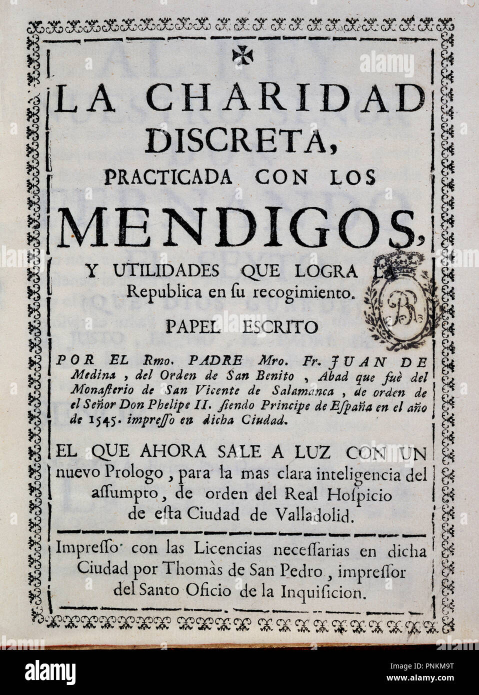 LA CARIDAD DISCRETA PRACTICADA CON LOS MENDIGOS. Author: MEDINA JUAN DE. Location: BIBLIOTECA NACIONAL-COLECCION. MADRID. SPAIN. Stock Photo