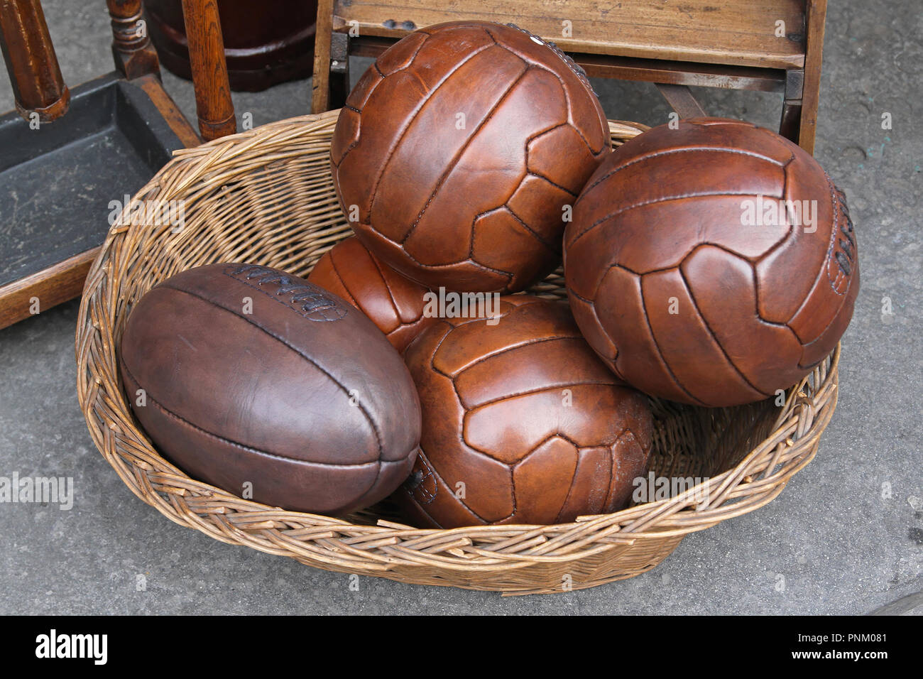 Vintage style leather balls for volleyball and rugby Stock Photo Alamy