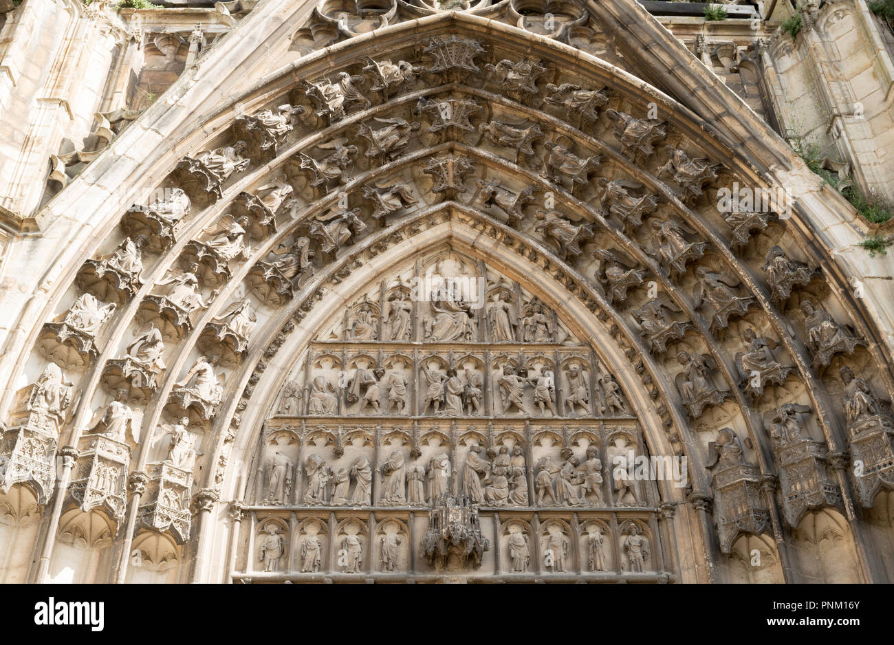 Tympanum above the main portal in the south transept of the Cathédrale Saint Étienne, in Auxerre, Burgundy, France, Europe Stock Photo