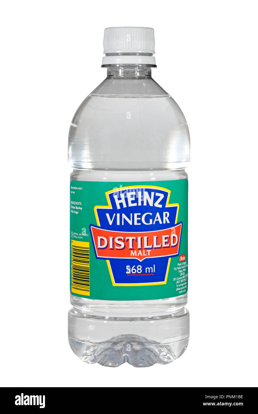 A 568 ml bottle of Heinz distilled malt vinegar - white vinegar - isolated on a white background Stock Photo