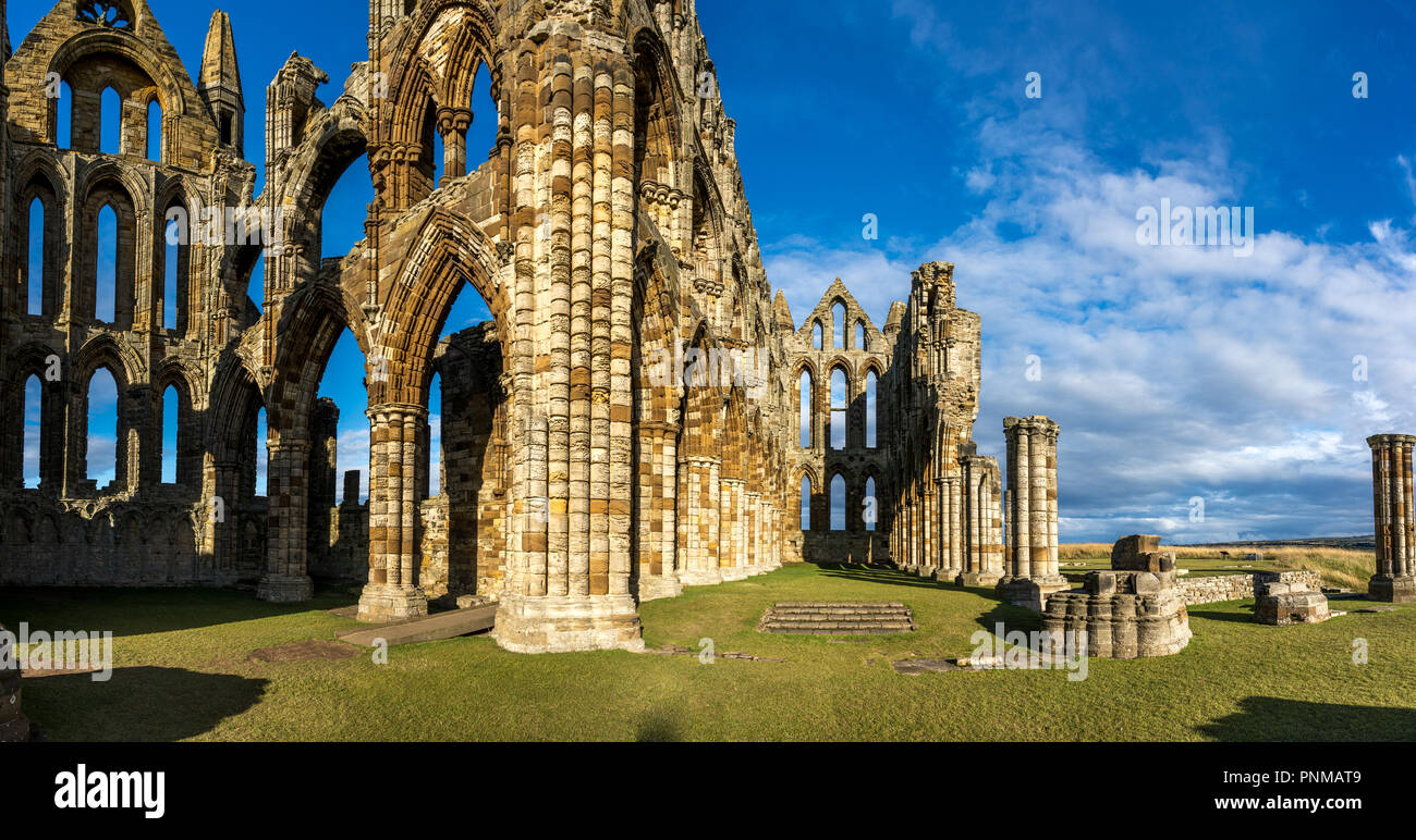 Whitby Abbey North Yorkshire Coast UK. Perched high on a cliff, the haunting remains of Whitby Abbey were inspiration for Bram Stoker's gothic tale of Stock Photo