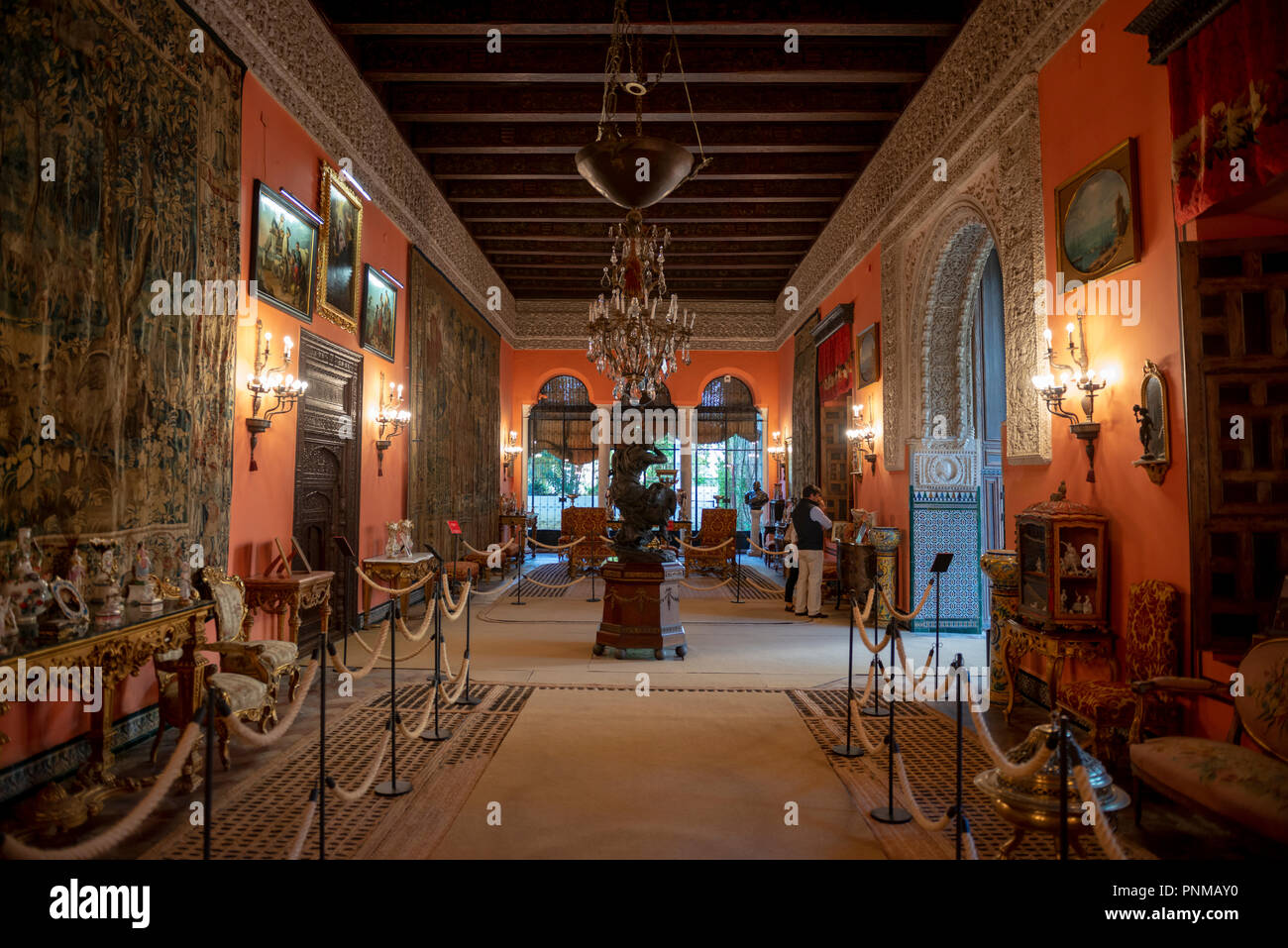 Interior room with statue, ballroom, Palacio de las Dueñas, Seville, Andalusia, Spain Stock Photo