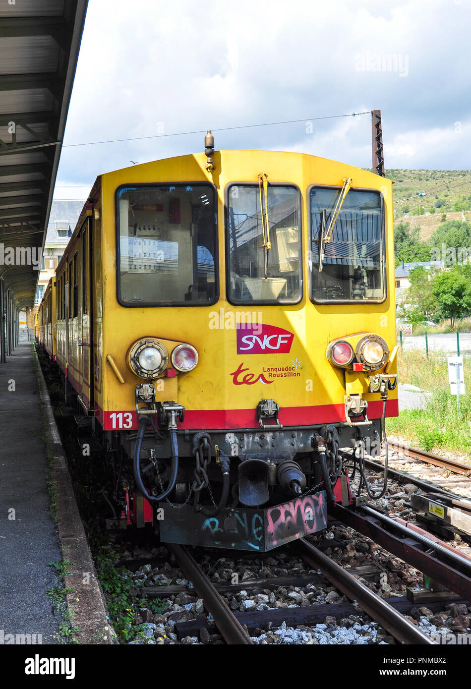 'The Little Yellow Train' at Latour-de-Carol, Pyrenees-Orientales, Occitanie, France Stock Photo