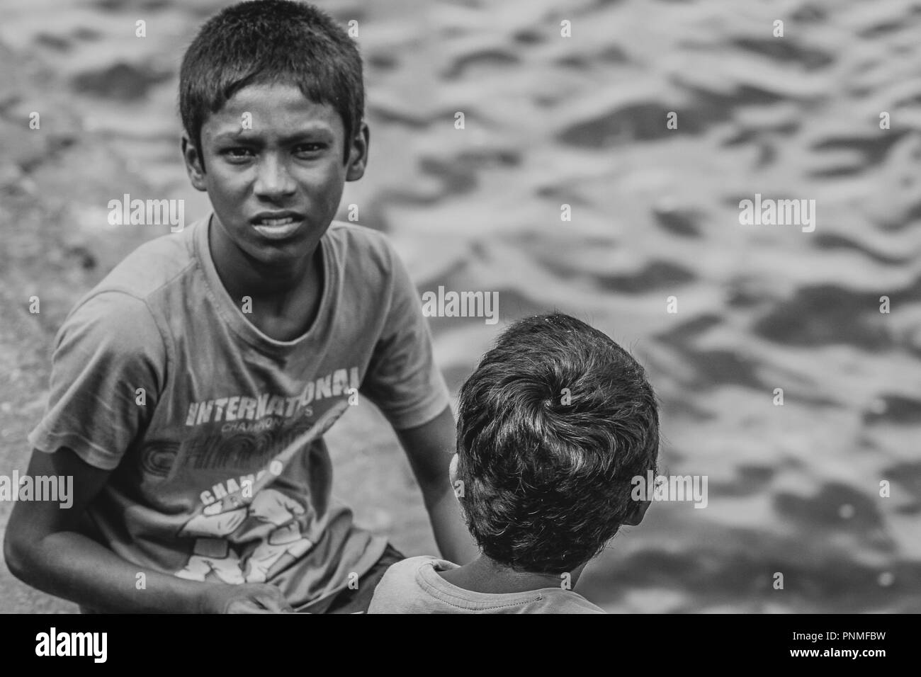 Portrait of a Sri lankan street boy at Tissamaharama Stock Photo