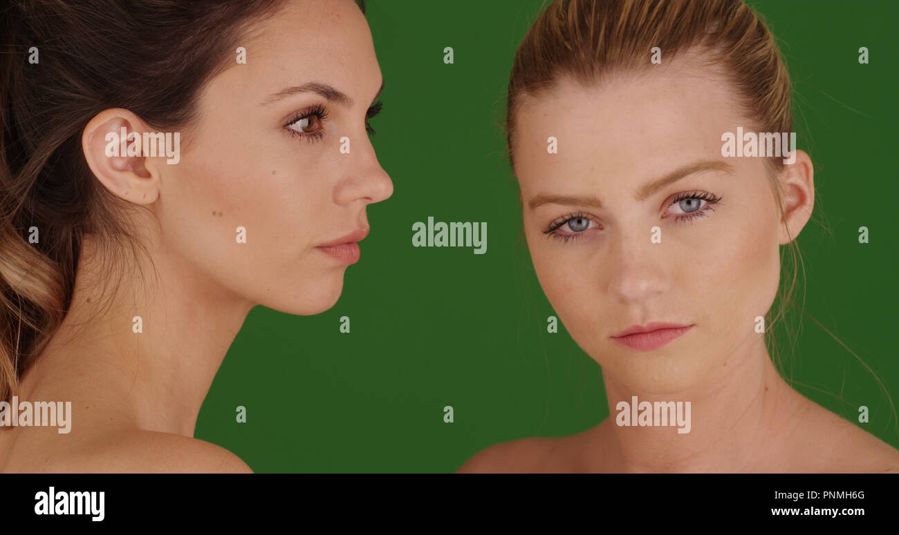 Portrait of a pair of lovely white women wearing makeup of green screen