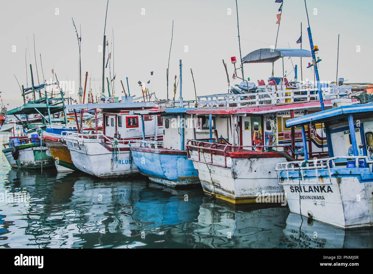Boats under repair at Dewundara Fishery Harbour, Sri Lanka Stock Photo Alamy