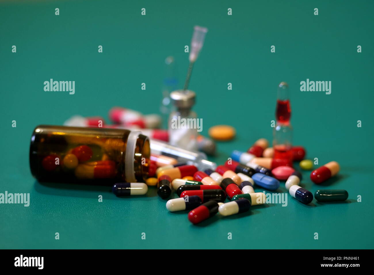 Medication capsules in an opened prescription bottle. Medicine