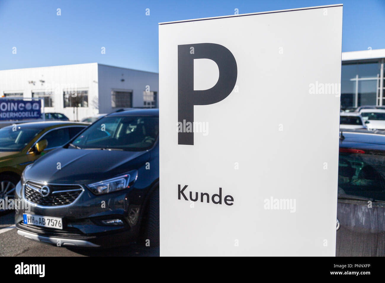 FUERTH / GERMANY - FEBRUARY 25, 2018: Parking area sign near a Volkswagen car dealer. Kunde means customer. Volkswagen is a German automaker founded o Stock Photo