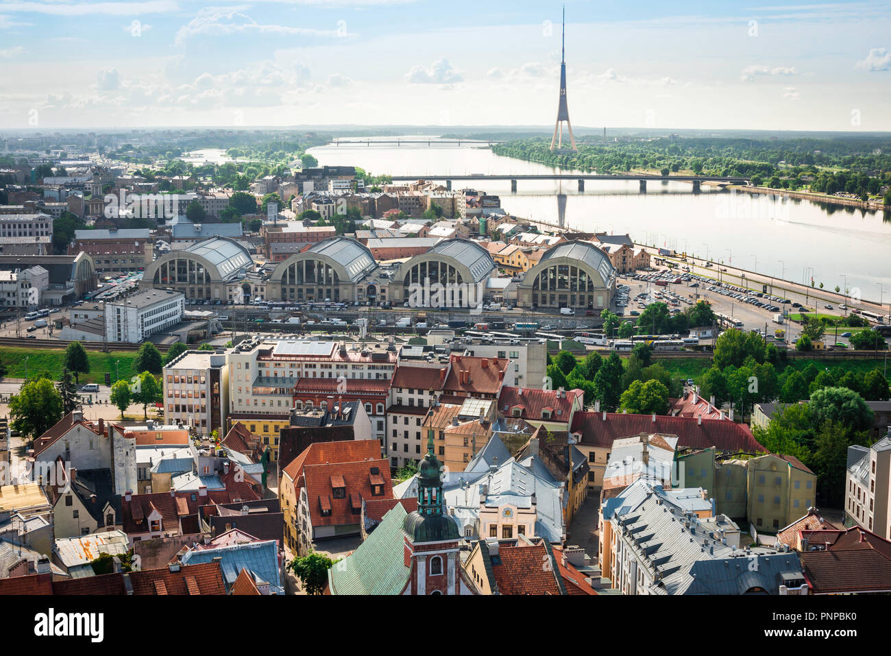 Riga cityscape, view south over Riga Old Town towards the Central Market Zeppelin hangar buildings and the 'Moscow Suburb' beyond, Latvia. Stock Photo