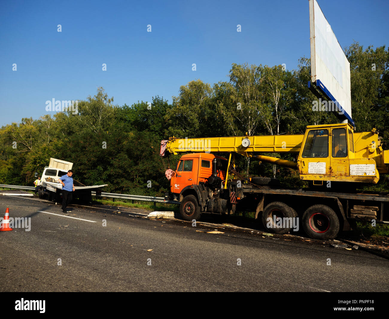Road accident of truck crane and truck on the highway Boryspil - Kiev Stock Photo