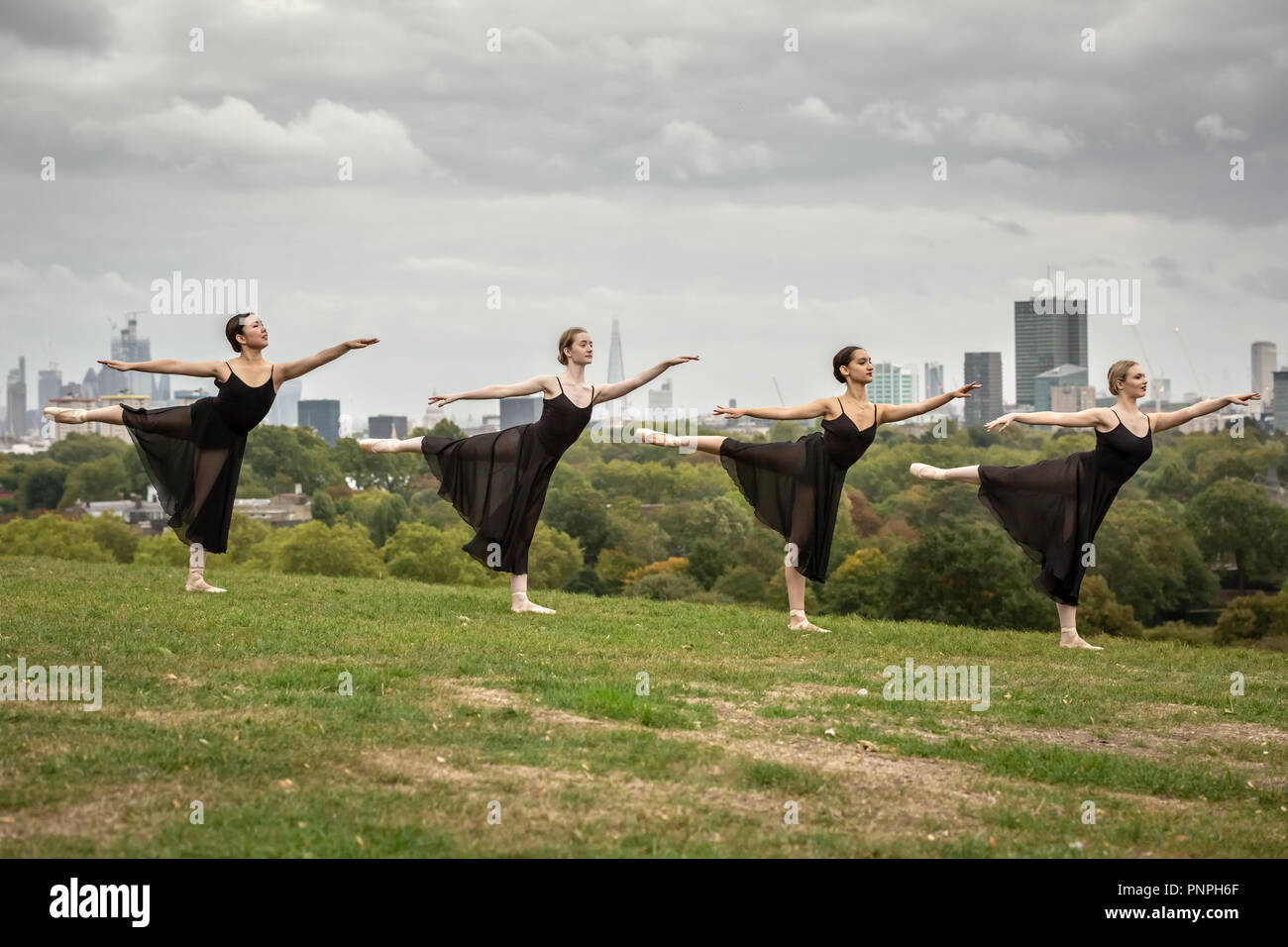 London, UK. 22nd September, 2018. Dancers from Semaphore Ballet Company perform on Primrose Hill on the last day of summer before the autumnal equinox. (L-R) Natsuki Uemura, Aoife Doherty, Rebecca Olarescu and Beth Wareing. Credit: Guy Corbishley/Alamy Live News Stock Photo