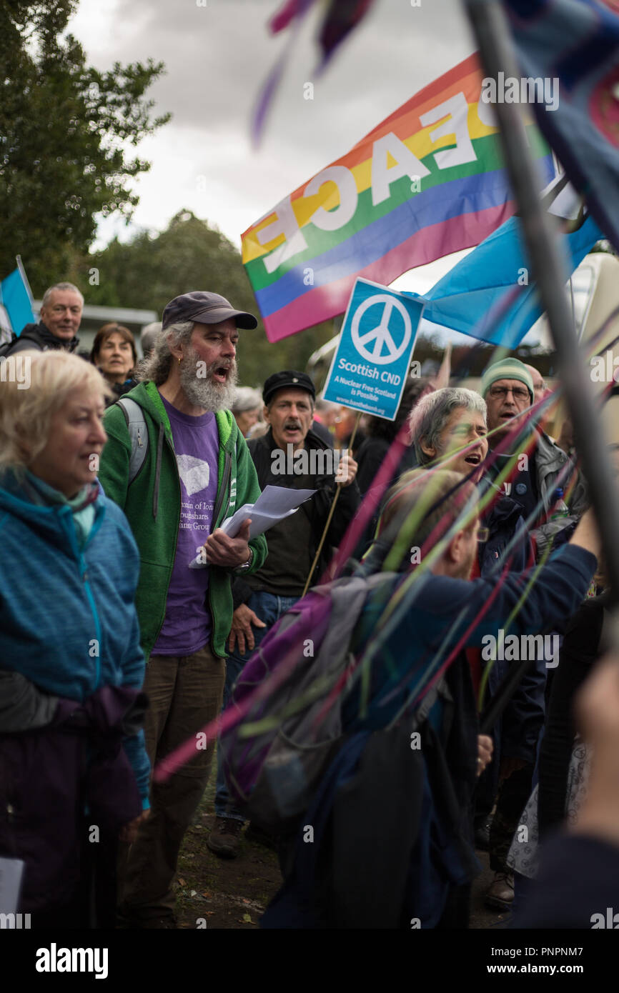 Faslane, Scotland, on 22 September 2018. 'Nae (No) Nukes Anywhere' anti-nuclear weapons demonstration at the Faslane Peace Camp and walking to a rally outside HM Naval Base Clyde, home to the core of the UK's Submarine Service, in protest against Trident nuclear missiles. The rally was attended by peace protestors from across the UK who came 'to highlight the strength of support from many UN member states for Scotland, a country hosting nuclear weapons against its wishes'. Photo Credit Jeremy Sutton-Hibbert/ Alamy News. Stock Photo