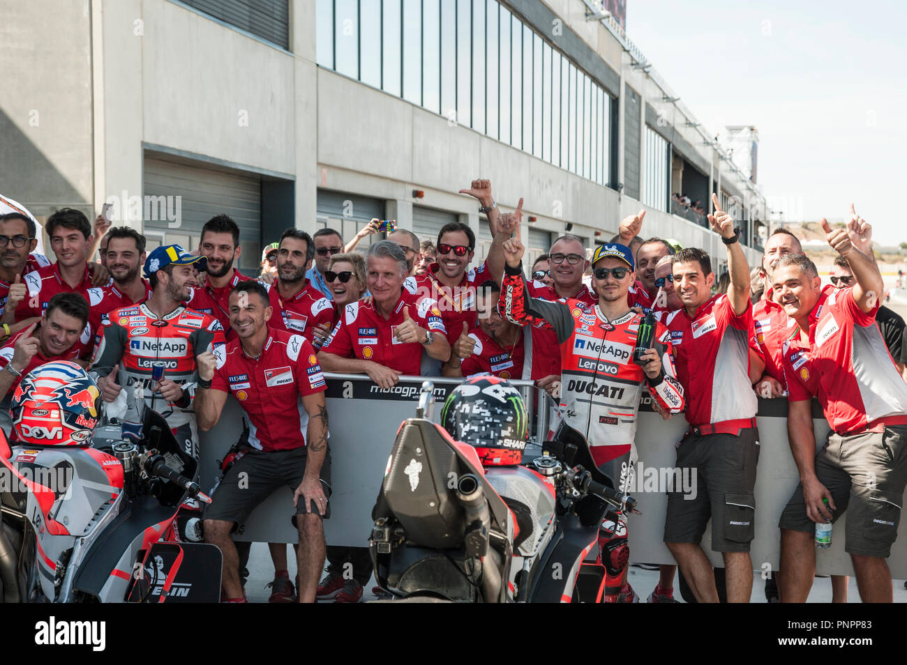 22nd September 2018, Ciudad del Motor de Aragon, Alcaniz, Spain; Motorcycling MotoGP of Aragon, Qualification; Andrea Dovizioso and Jorge Lorenzo (Ducati Team) celebrate the first row on grid Stock Photo