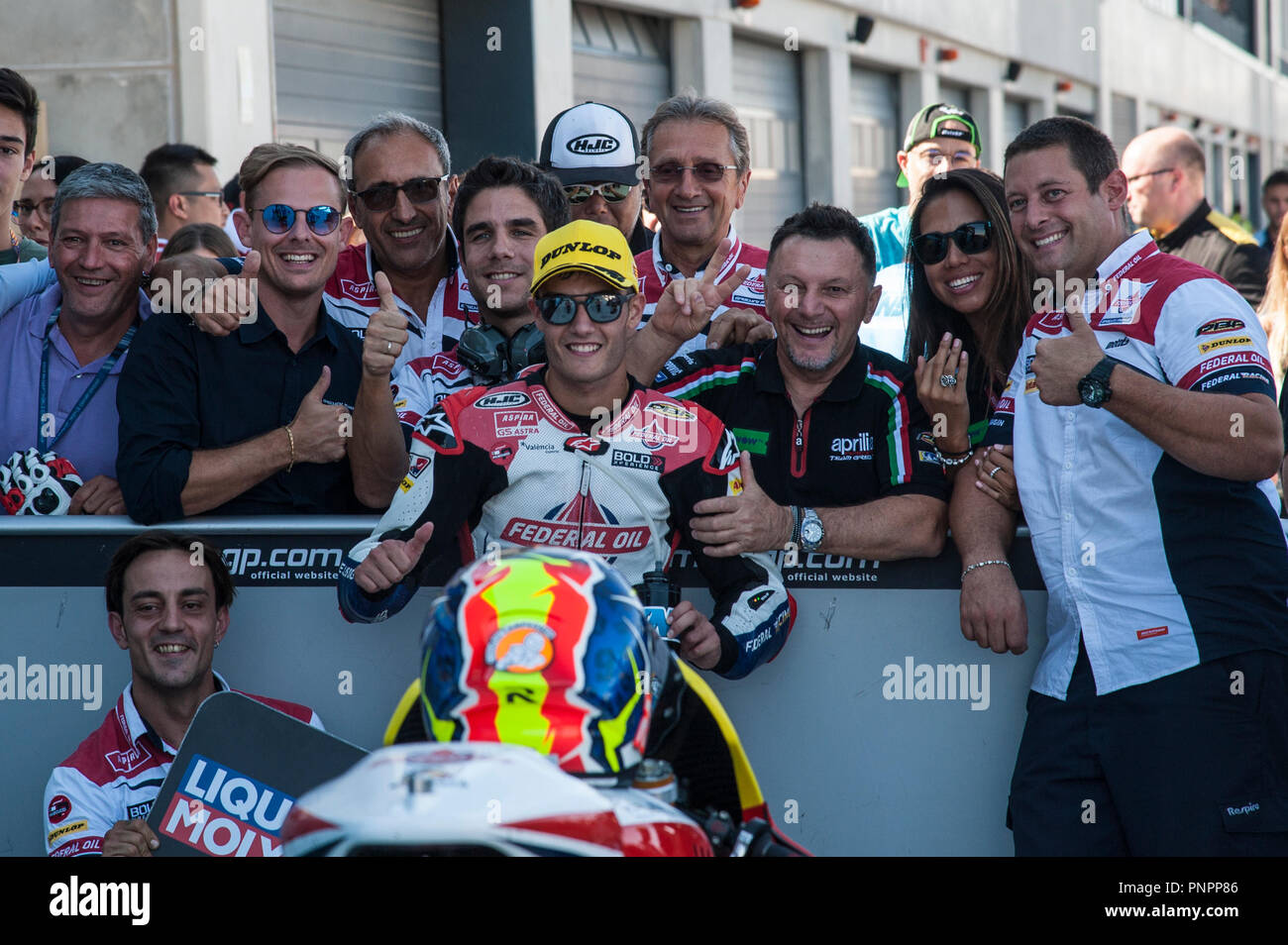 22nd September 2018, Ciudad del Motor de Aragon, Alcaniz, Spain; Motorcycling MotoGP of Aragon, Qualification; Moto2 Jorge Navarro (Federal Oil Gresini Moto2) celebrates the first row with team Stock Photo