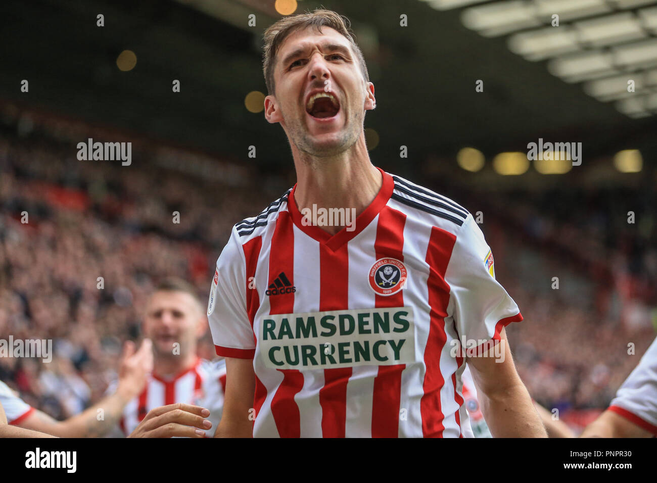22nd September 2018, Bramall Lane, Sheffield, England; Sky Bet Championship Sheffield United v Preston North End ;  Chris Basham (06) of Sheffield United celebrates his goal to make it 2-0    Credit: Mark Cosgrove/News Images    EDITORIAL USE ONLY No use with unauthorised audio, video, data, fixture lists, club/league logos or 'live' services. Online in-match use limited to 45 images, no video emulation. No use in betting, games or single club/league/player publications and all English Football League images are subject to DataCo Licence Stock Photo