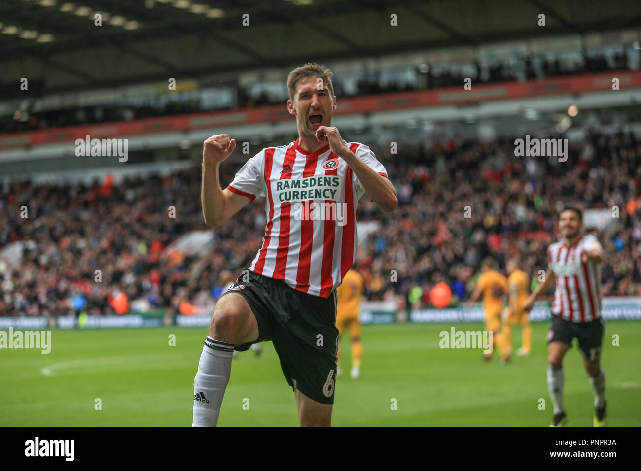 22nd September 2018, Bramall Lane, Sheffield, England; Sky Bet Championship Sheffield United v Preston North End ;  Chris Basham (06) of Sheffield United celebrates his goal to make it 2-0    Credit: Mark Cosgrove/News Images    EDITORIAL USE ONLY No use with unauthorised audio, video, data, fixture lists, club/league logos or 'live' services. Online in-match use limited to 45 images, no video emulation. No use in betting, games or single club/league/player publications and all English Football League images are subject to DataCo Licence Stock Photo