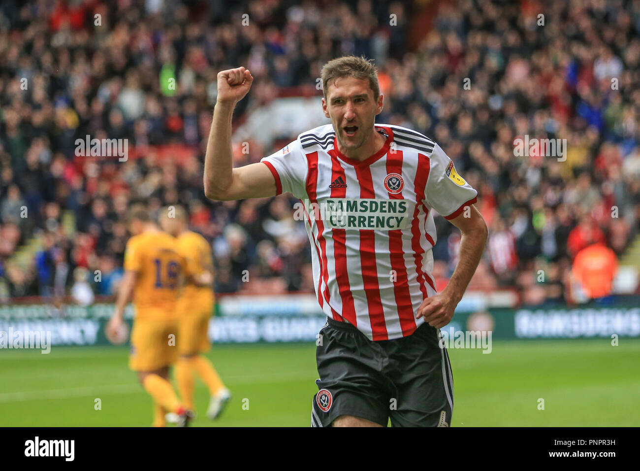22nd September 2018, Bramall Lane, Sheffield, England; Sky Bet Championship Sheffield United v Preston North End ; Chris Basham (06) of Sheffield United celebrates his goal to make it 2-0    Credit: Mark Cosgrove/News Images    EDITORIAL USE ONLY No use with unauthorised audio, video, data, fixture lists, club/league logos or 'live' services. Online in-match use limited to 45 images, no video emulation. No use in betting, games or single club/league/player publications and all English Football League images are subject to DataCo Licence Stock Photo