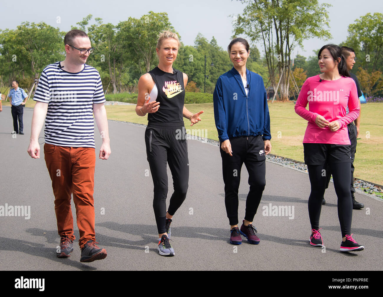 September 22, 2018 - Elina Svitolina of the Ukraine & Li Na of China head out to play tennis on the East Lake ahead of the 2018 Dongfeng Motor Wuhan Open WTA Premier 5 tennis tournament Credit: AFP7/ZUMA Wire/Alamy Live News Stock Photo