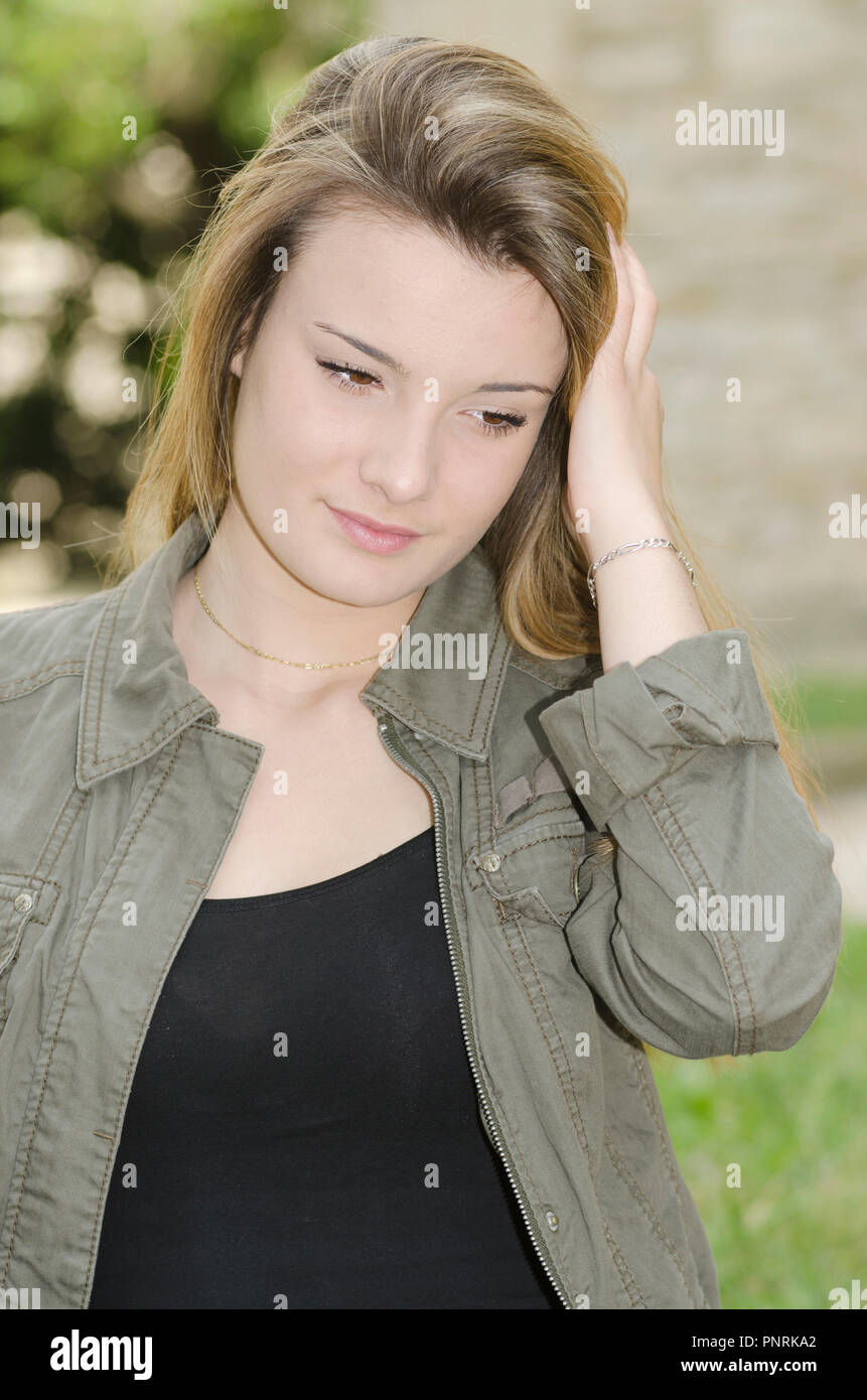 romantic young girl running his hand through his hair Stock Photo Alamy