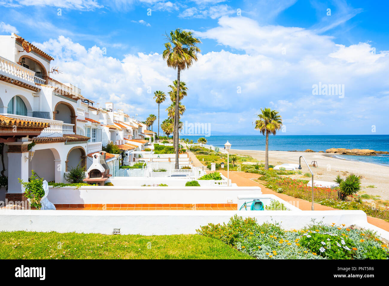 Holiday apartments on sea coast near Estepona town, Costa del Sol, Spain Stock Photo
