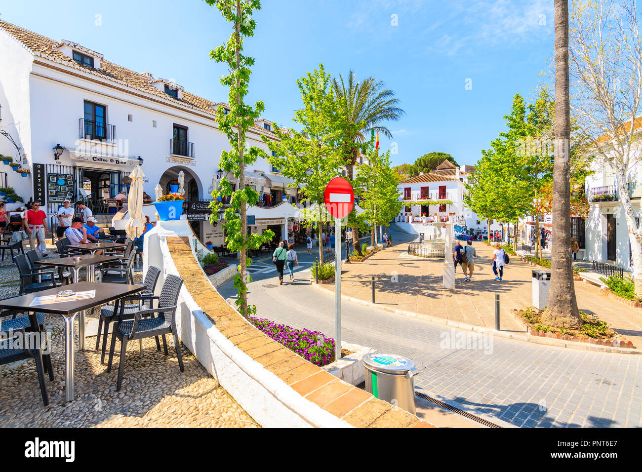MIJAS TOWN, SPAIN - MAY 9, 2018: Beautiful buildings in picturesque village of Mijas famous for white typical architecture of Andalusia. Spain is seco Stock Photo