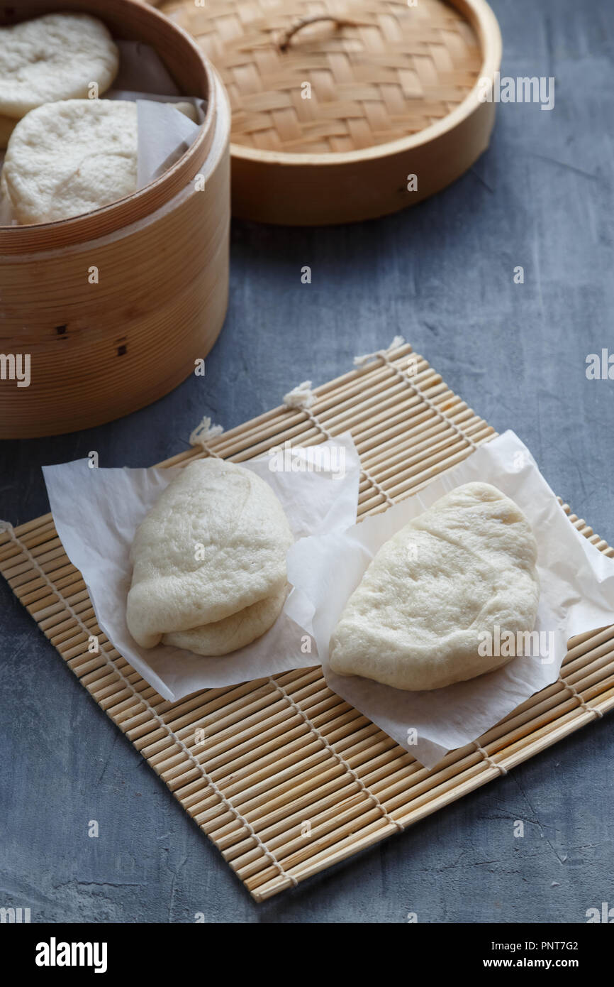 Gua bao, steamed buns in bamboo steamer, bao buns Stock Photo Alamy