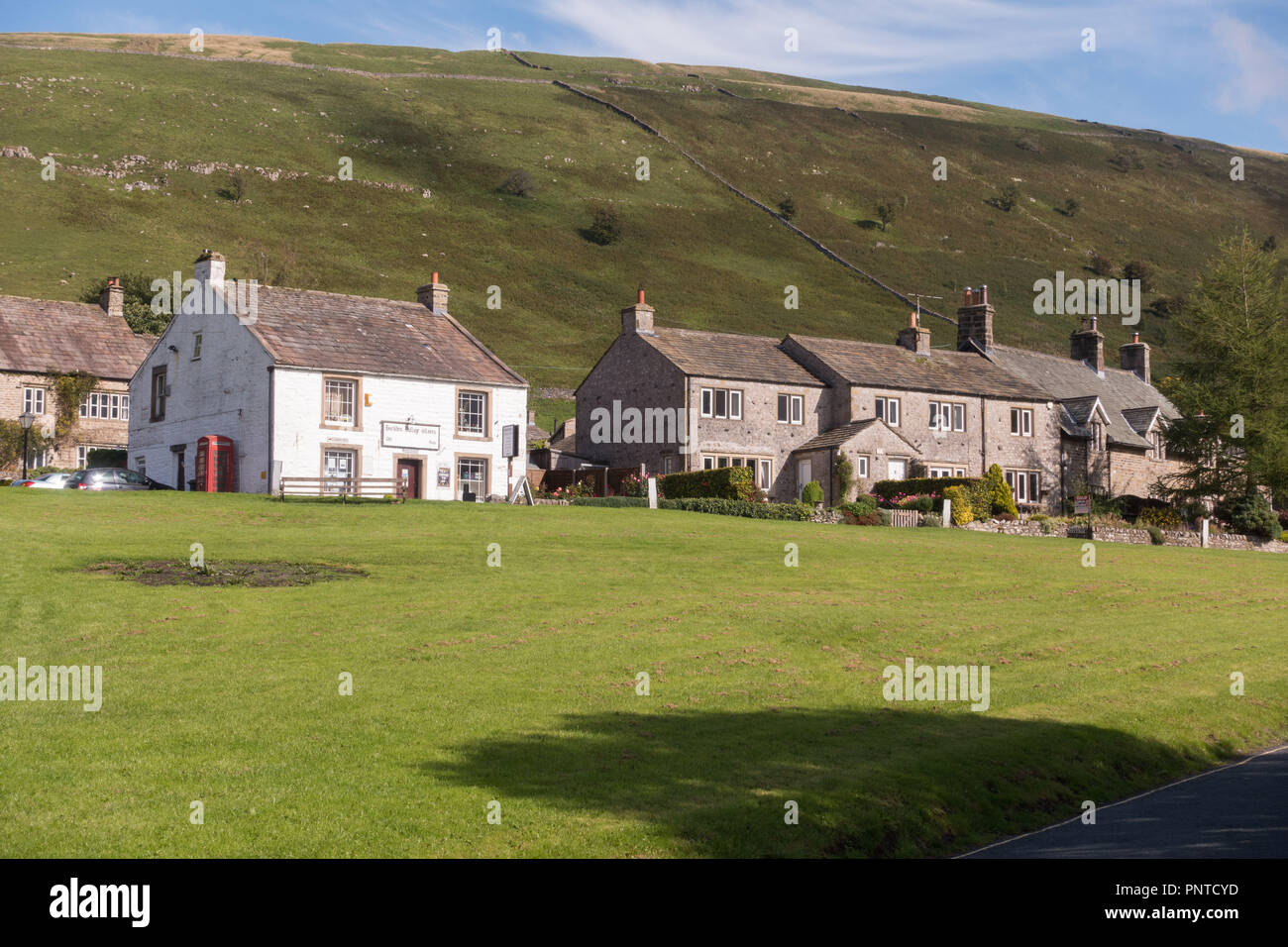 The village of Buckden,in Wharfedale, Yorkshire Dales, with Buckden Pike Stock Photo
