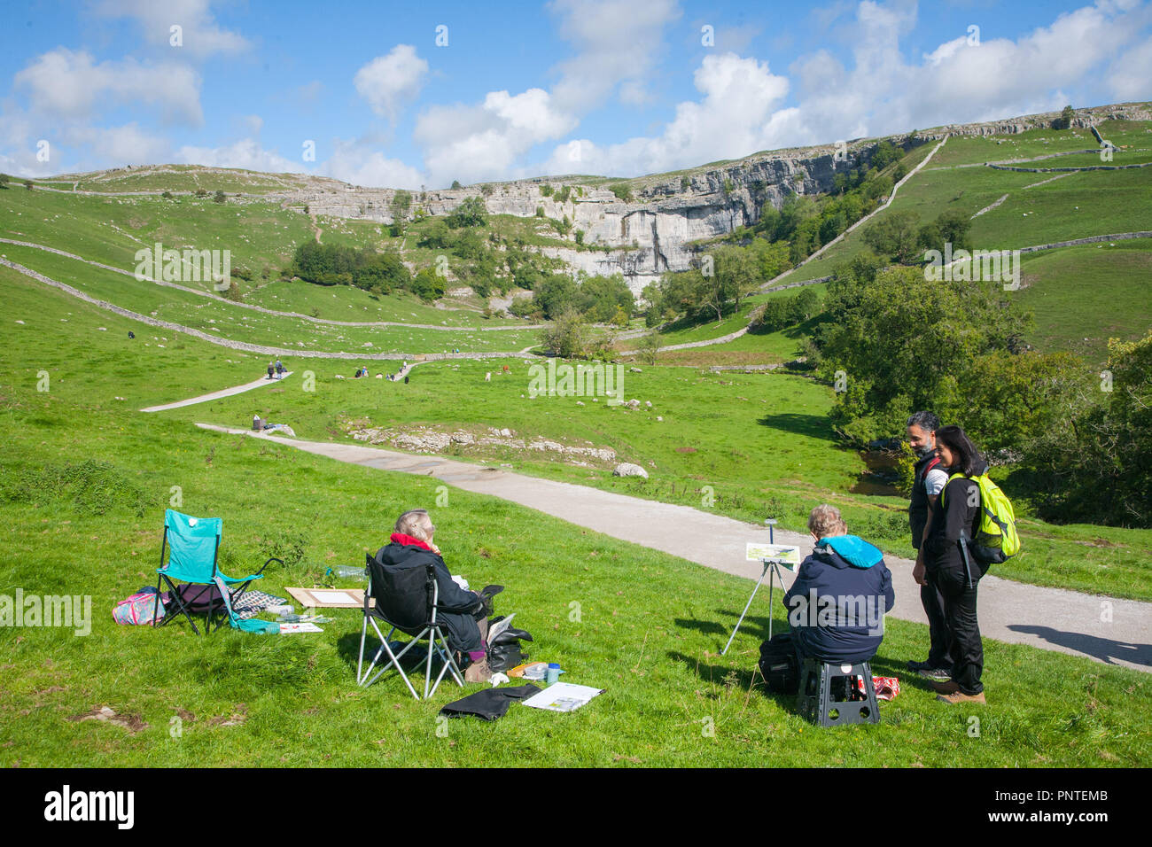 Art group painting Malham Cove in the Yorkshire Dales, England Stock Photo