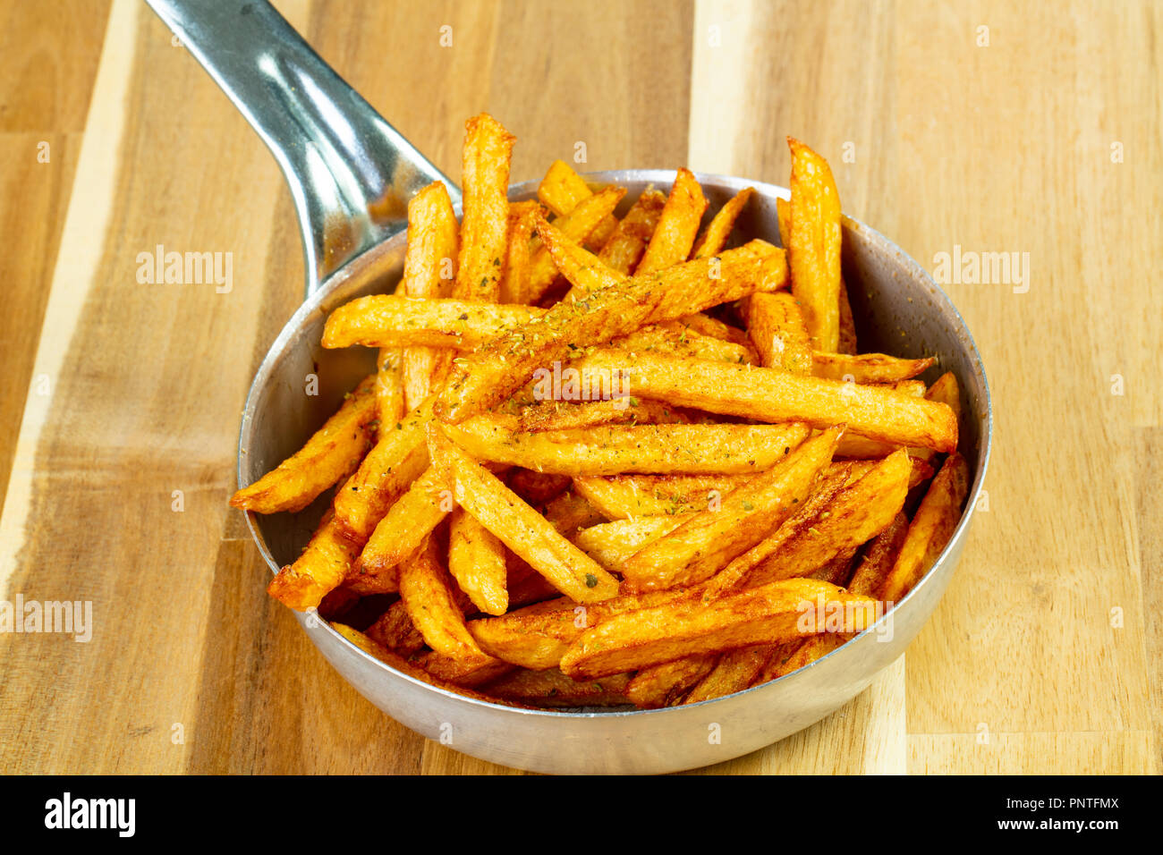 French fry potato with spices Stock Photo Alamy