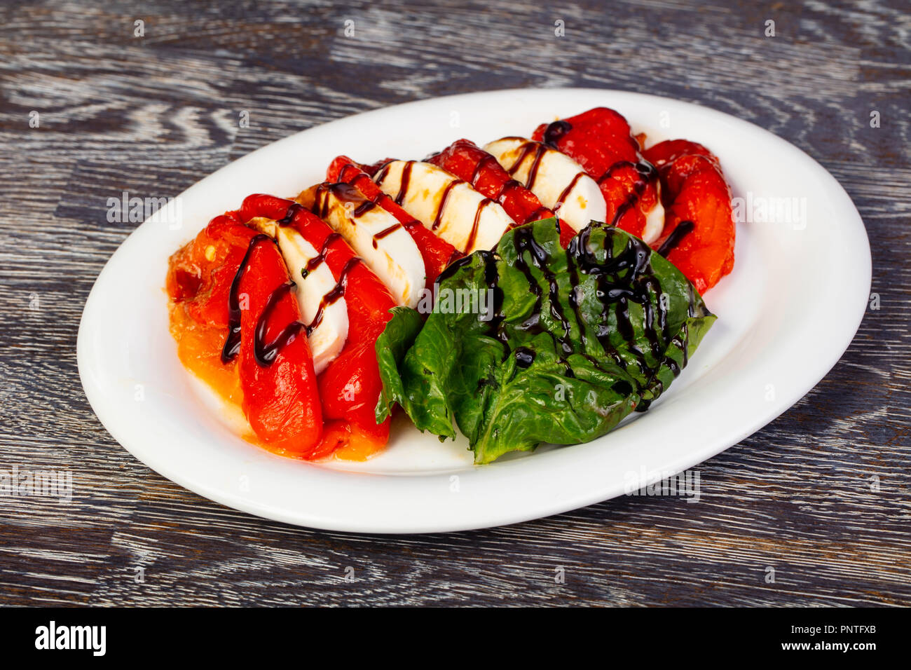 Tasty grilled pepper salad with mozzarella cheese Stock Photo Alamy