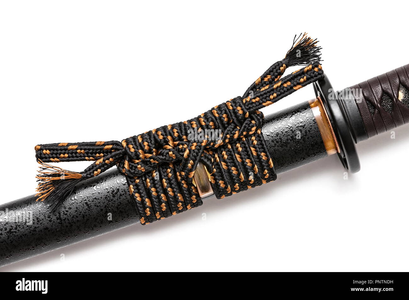 Sageo cord for tie the scabbard of Japanese sword isolated in white background. Stock Photo
