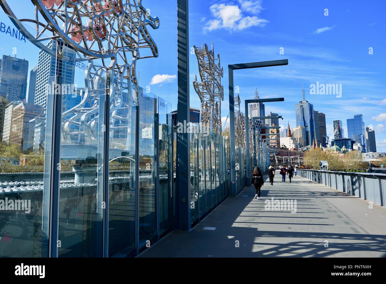 Sandridge bridge crossing the Yarra river from Southbank to the central ...
