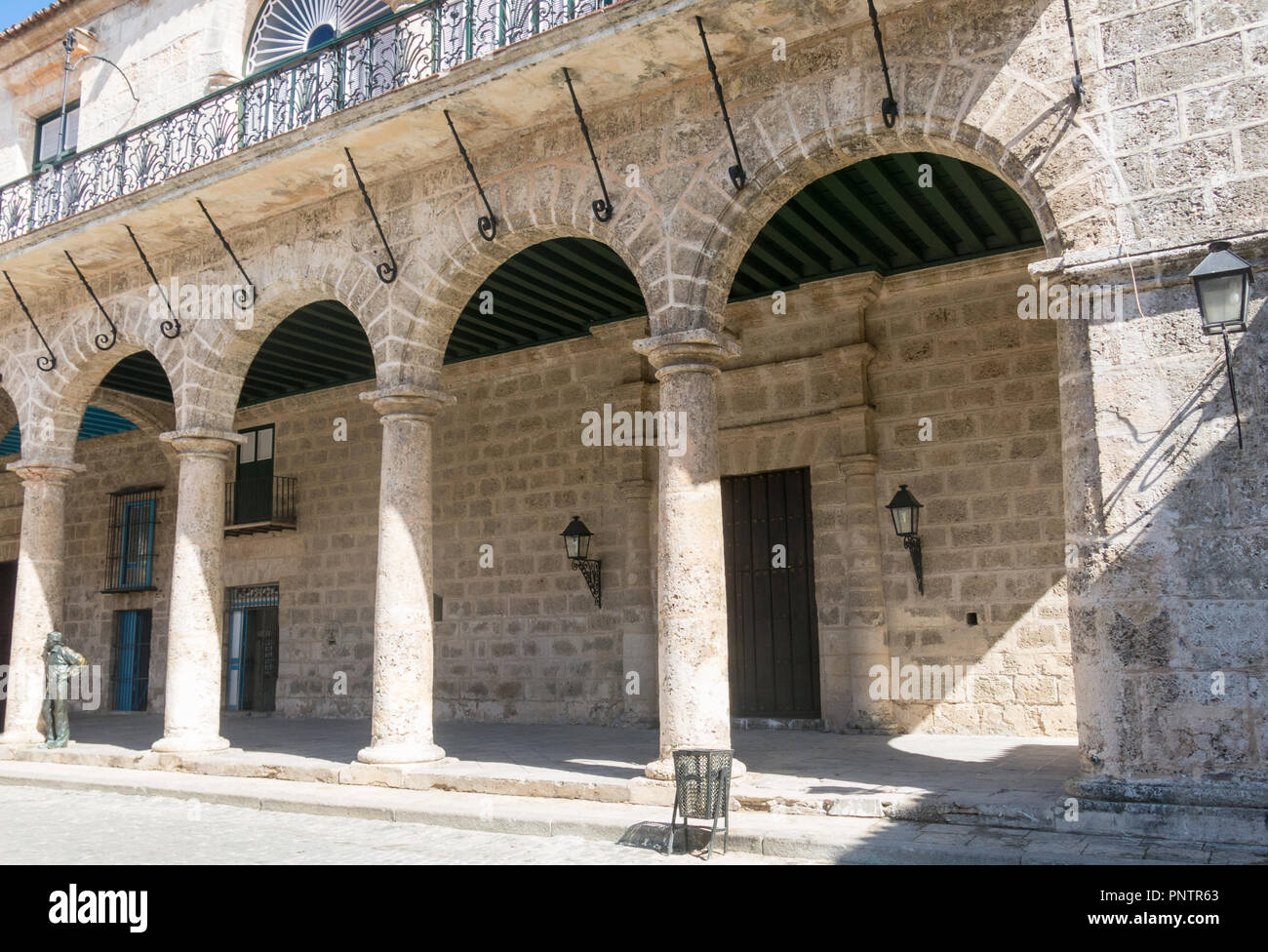 HAVANA, CUBA - JANUARY 16, 2017: Arcades of the Palace of the Conde Lombillo. in the Cathedral Square, Old Havana, Cuba. Statue of the flamenco dancer Stock Photo