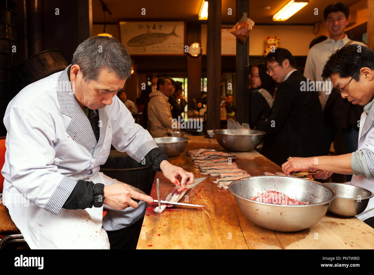 Japanese cook preparing eels at Narita Temple near Tokyo Stock Photo