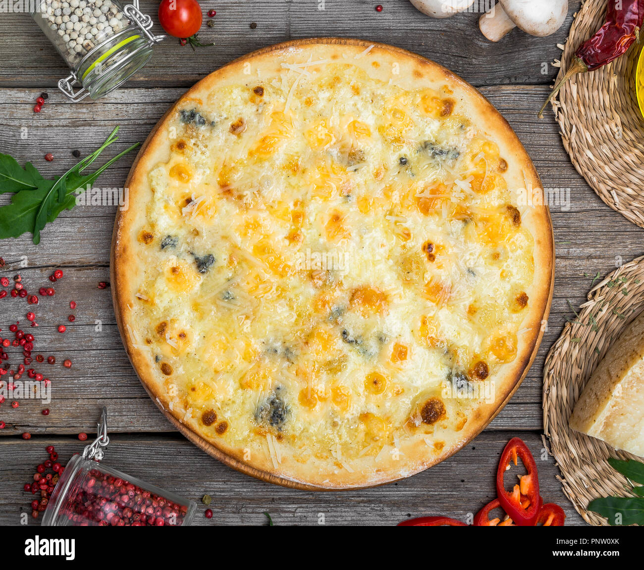 Pizza with tomatoes, mozzarella cheese. Delicious italian pizza Stock