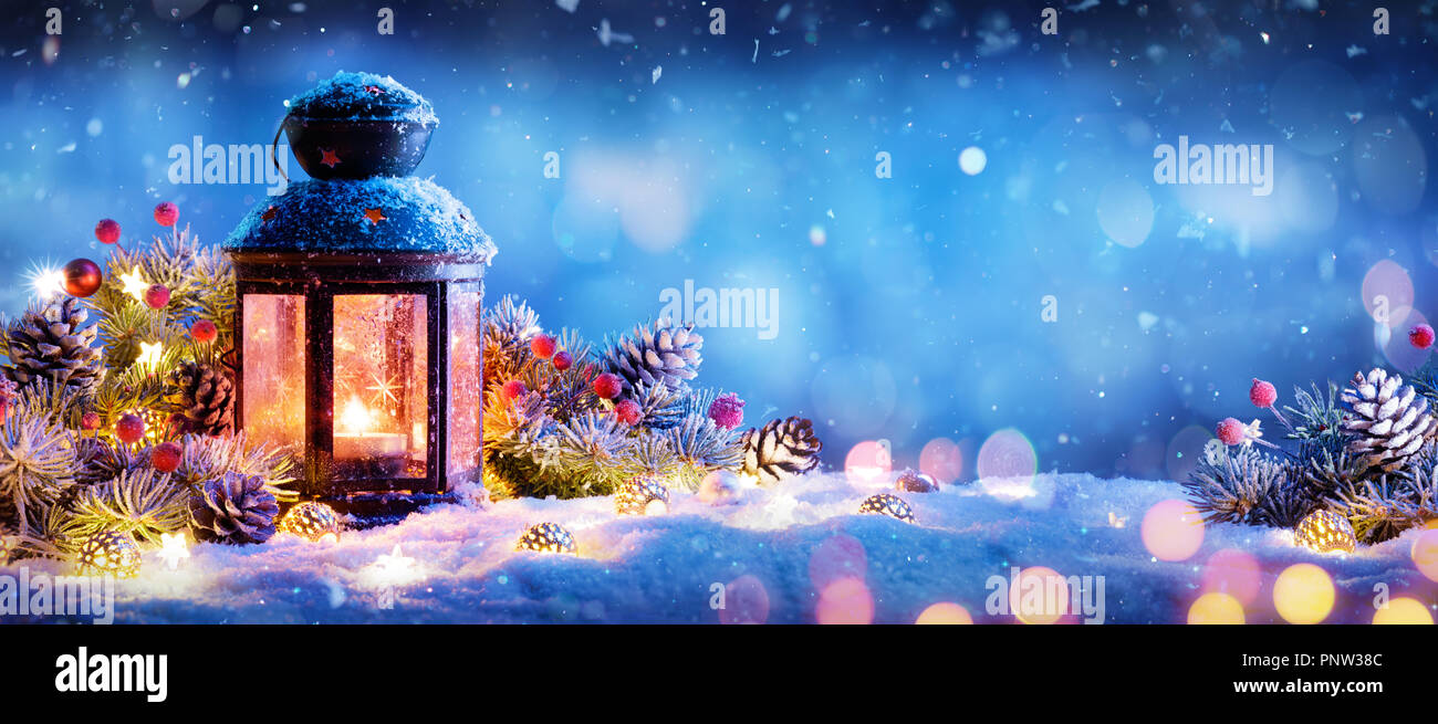 Christmas Decoration - Lantern With Ornament On Snow Stock Photo - Alamy