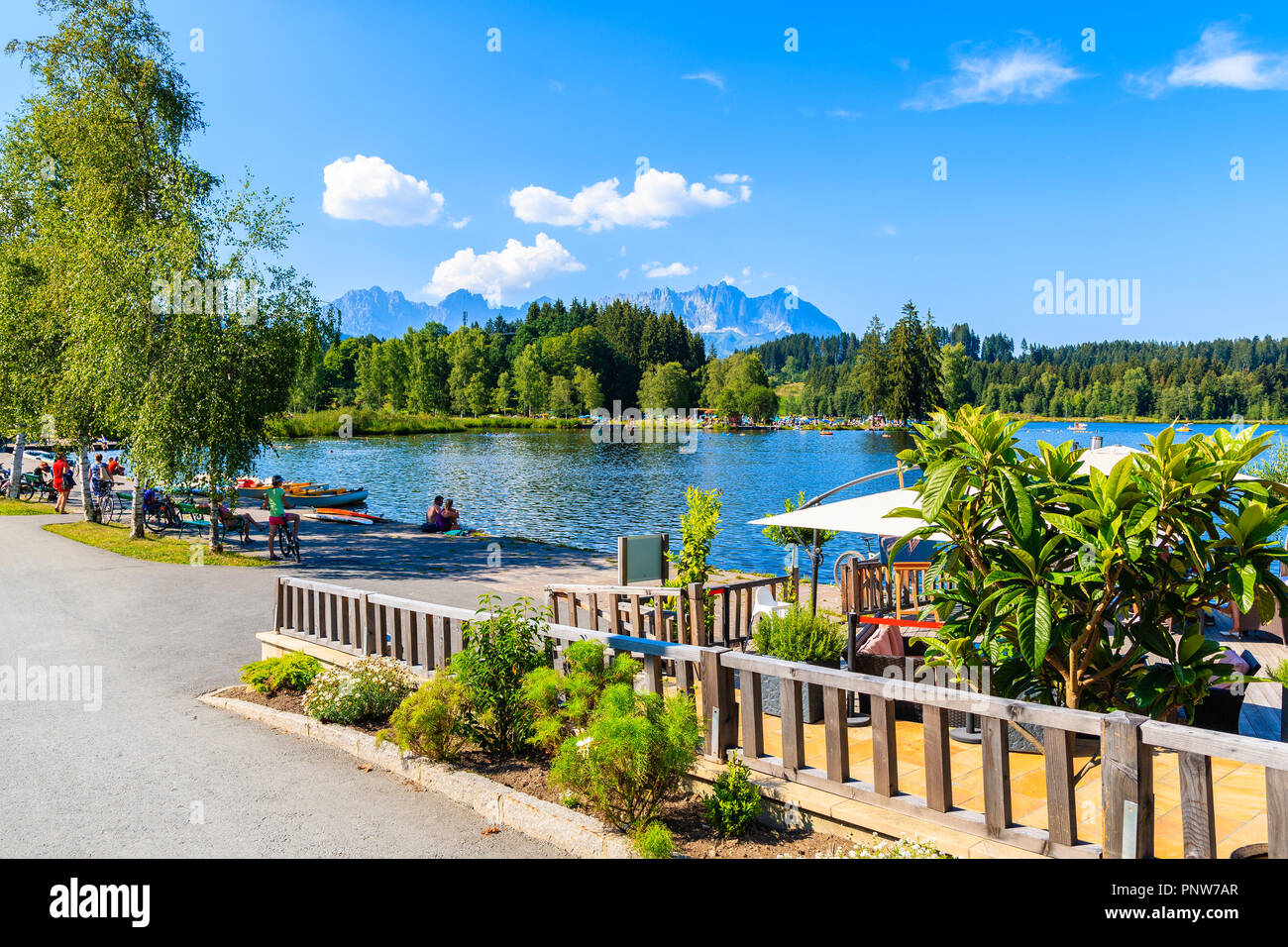 Shore of Schwarzsee lake on sunny beautiful summer day near Kitzbuhel, Tyrol, Austria Stock Photo