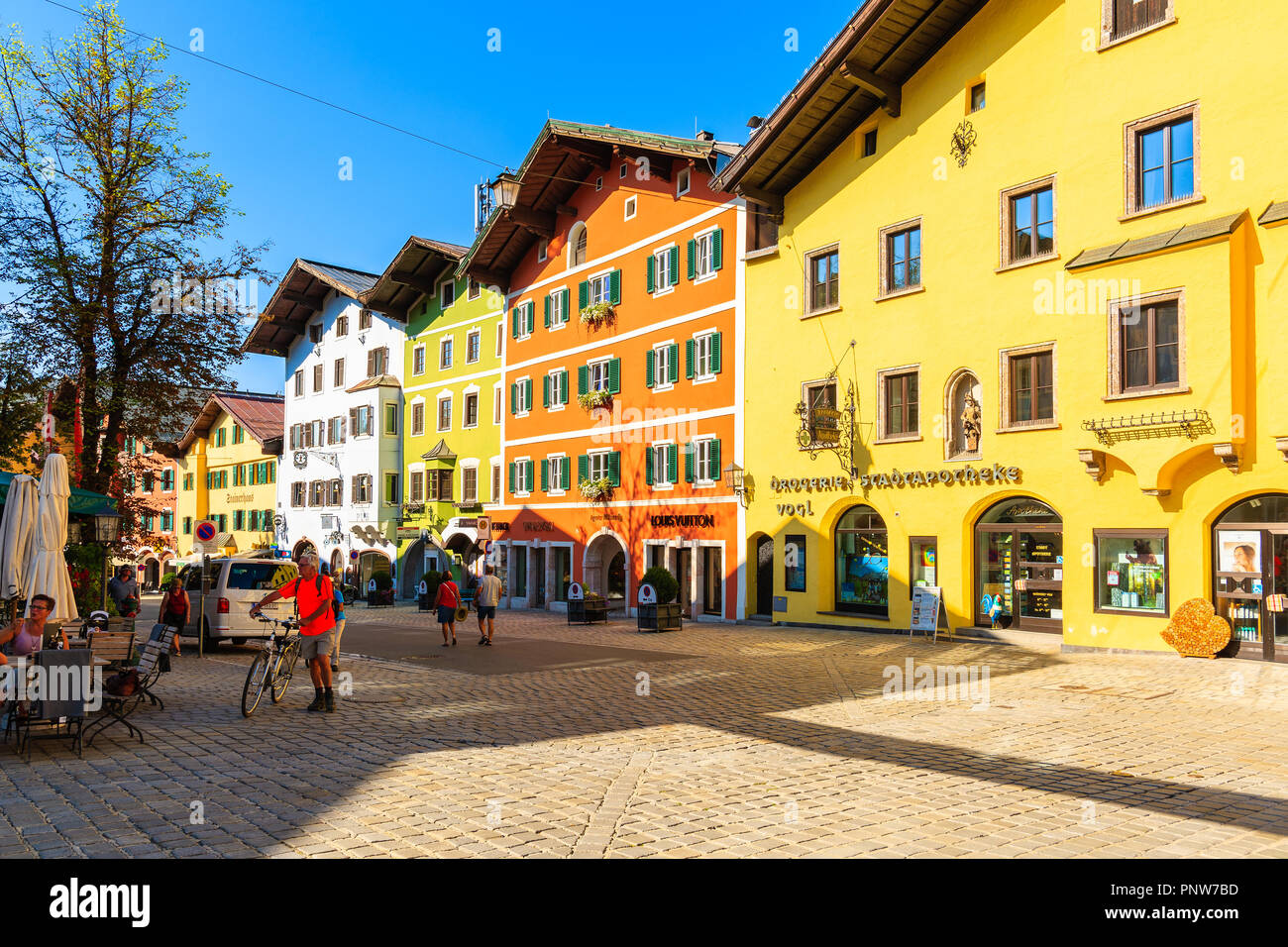 KITZBUHEL TOWN, AUSTRIA - JUL 30, 2018: Houses on street in Kitzbuhel town in summertime. It is one of the most famous Austrian winter sports destinat Stock Photo