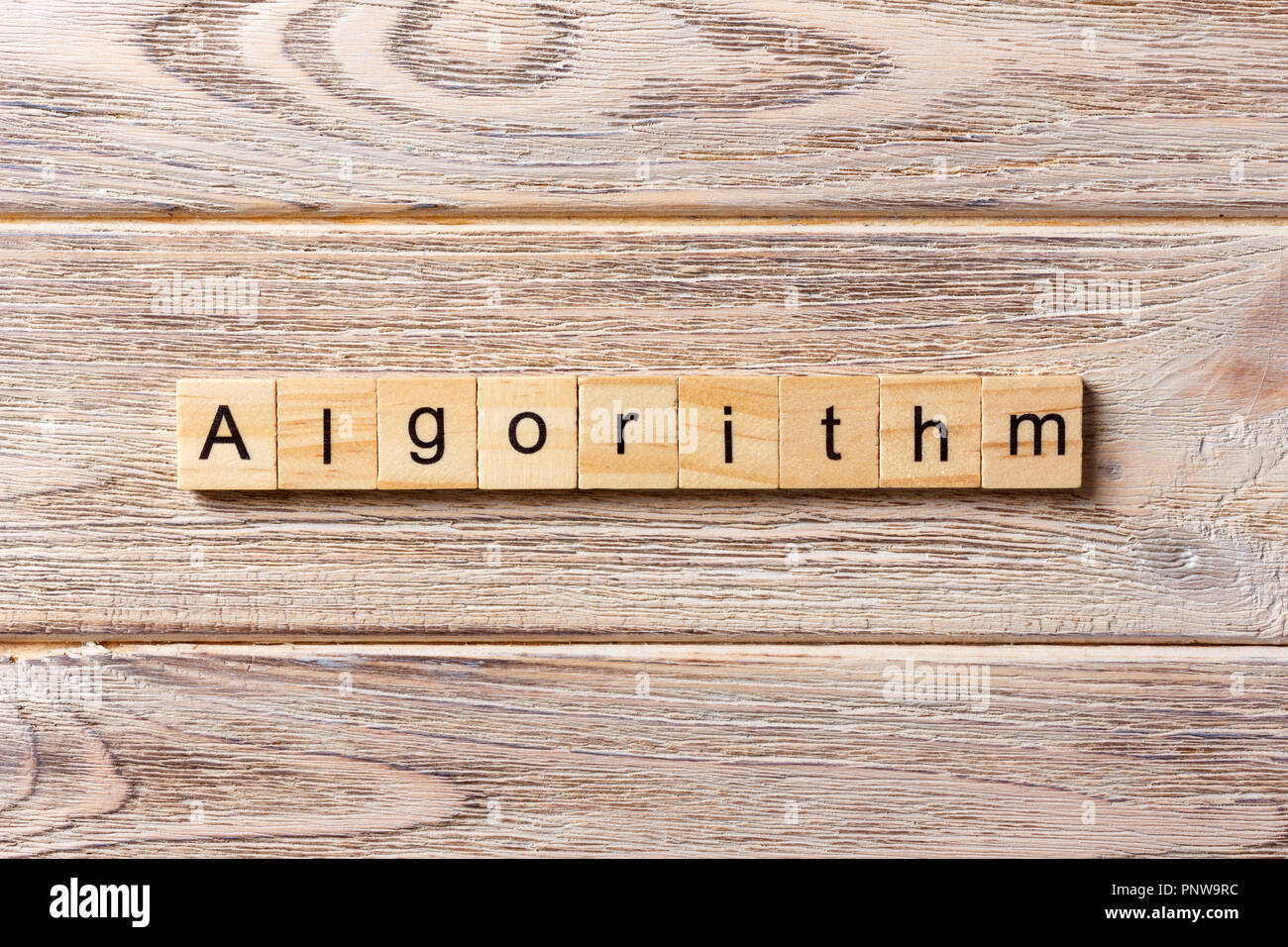 Algorithm word written on wood block. Algorithm text on table, concept ...