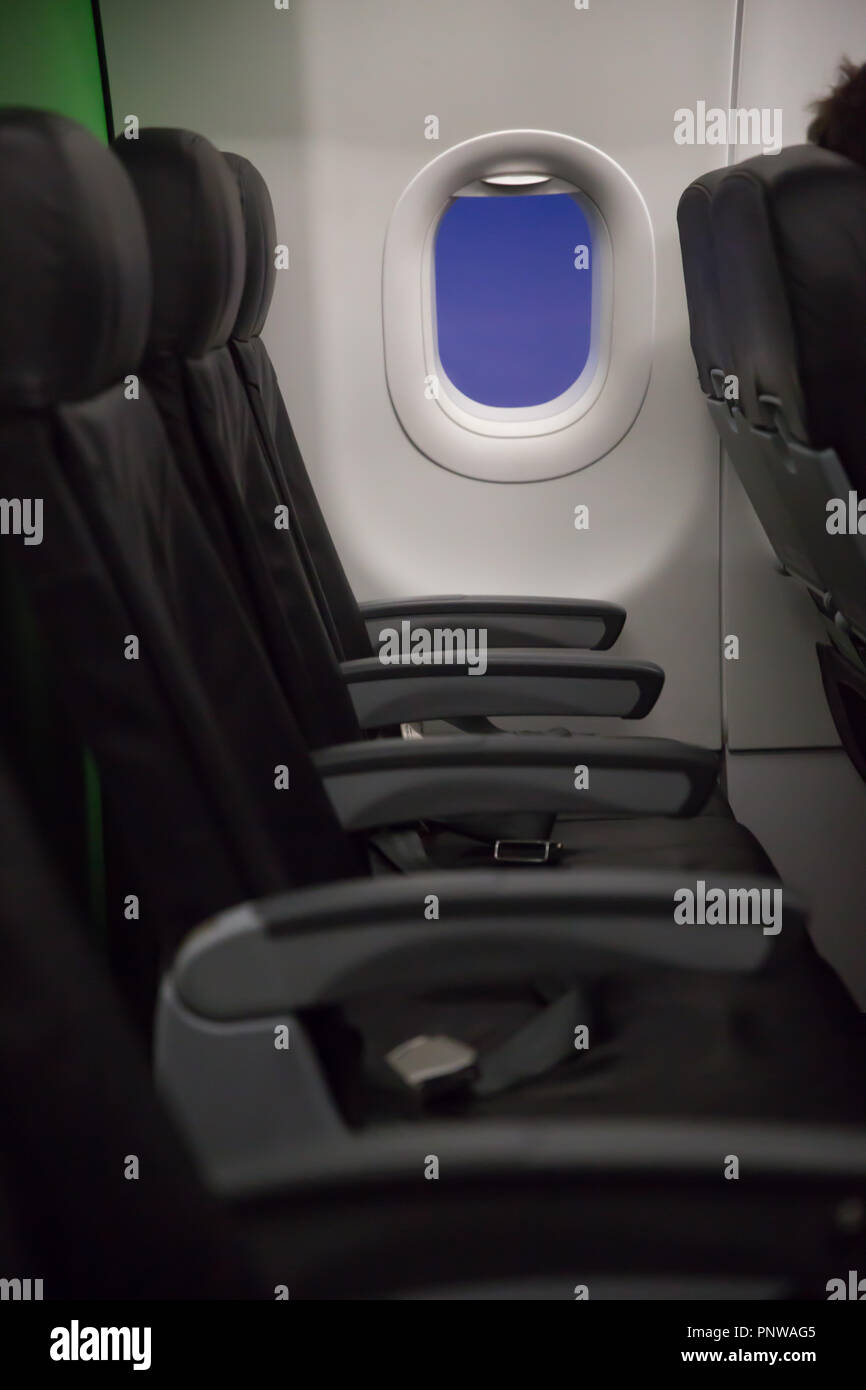 Passenger seats, Interior of airplane with passengers seats and window