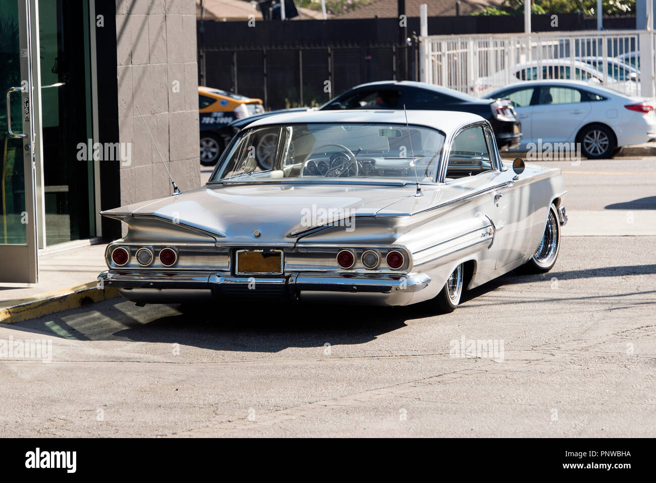 A view of a classic vintage car in the street in Los Angeles Stock