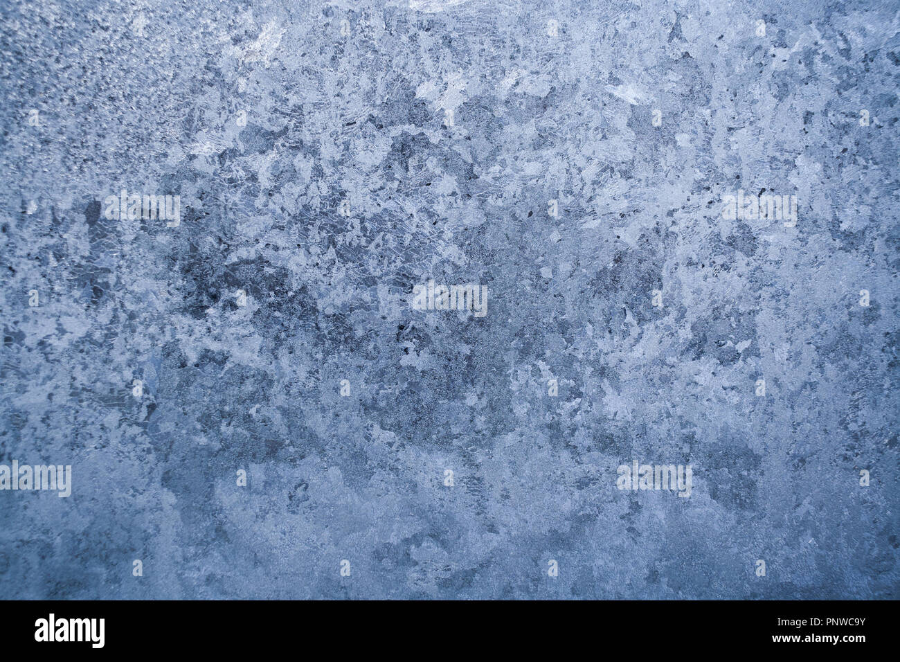 Frosty pattern on winter glass pane.  Stock Photo