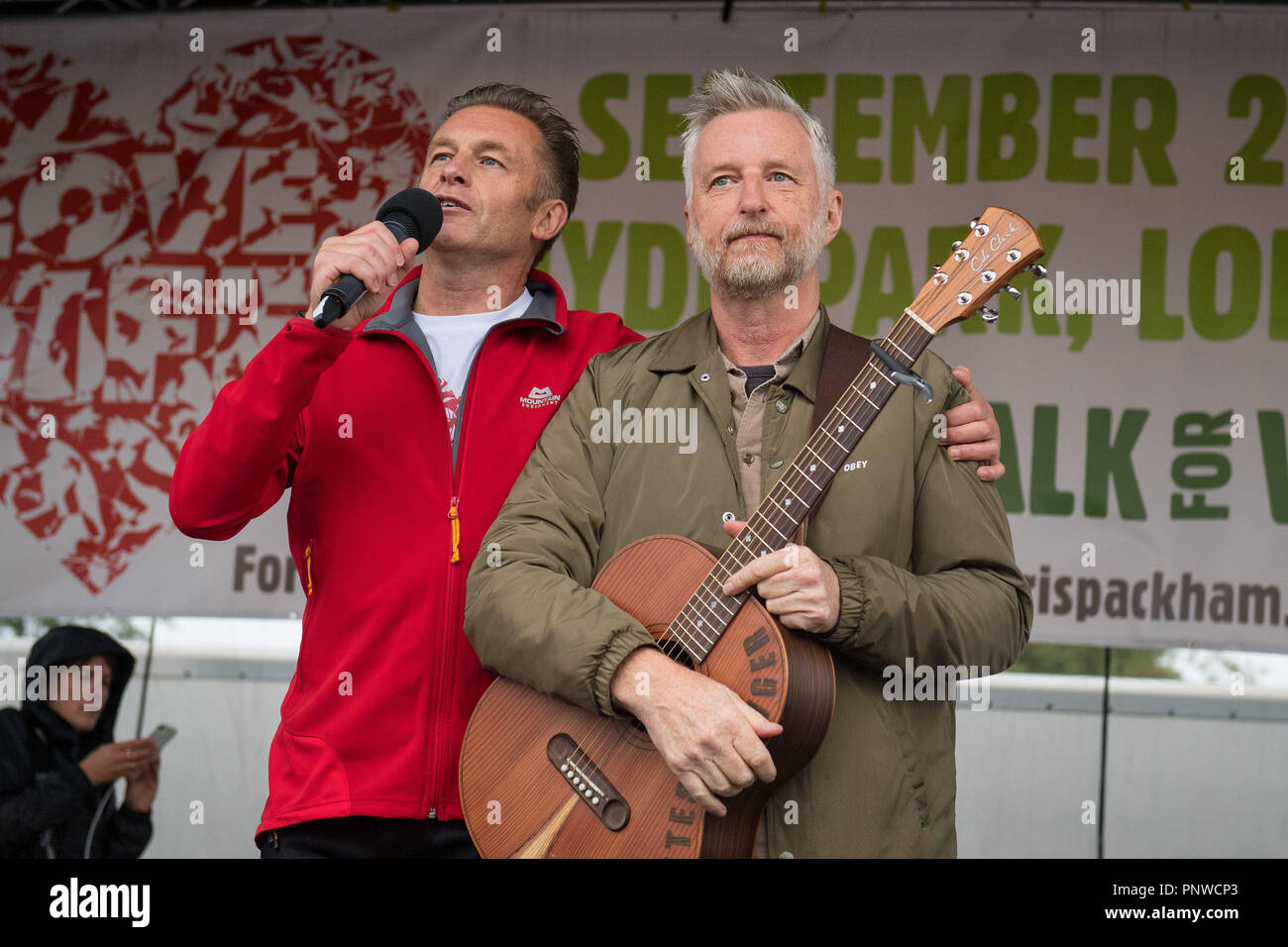 Chris Packham (left) and Billy Bragg onstage before the start of the People's Walk for Wildlife, in Hyde Park in central London. Stock Photo