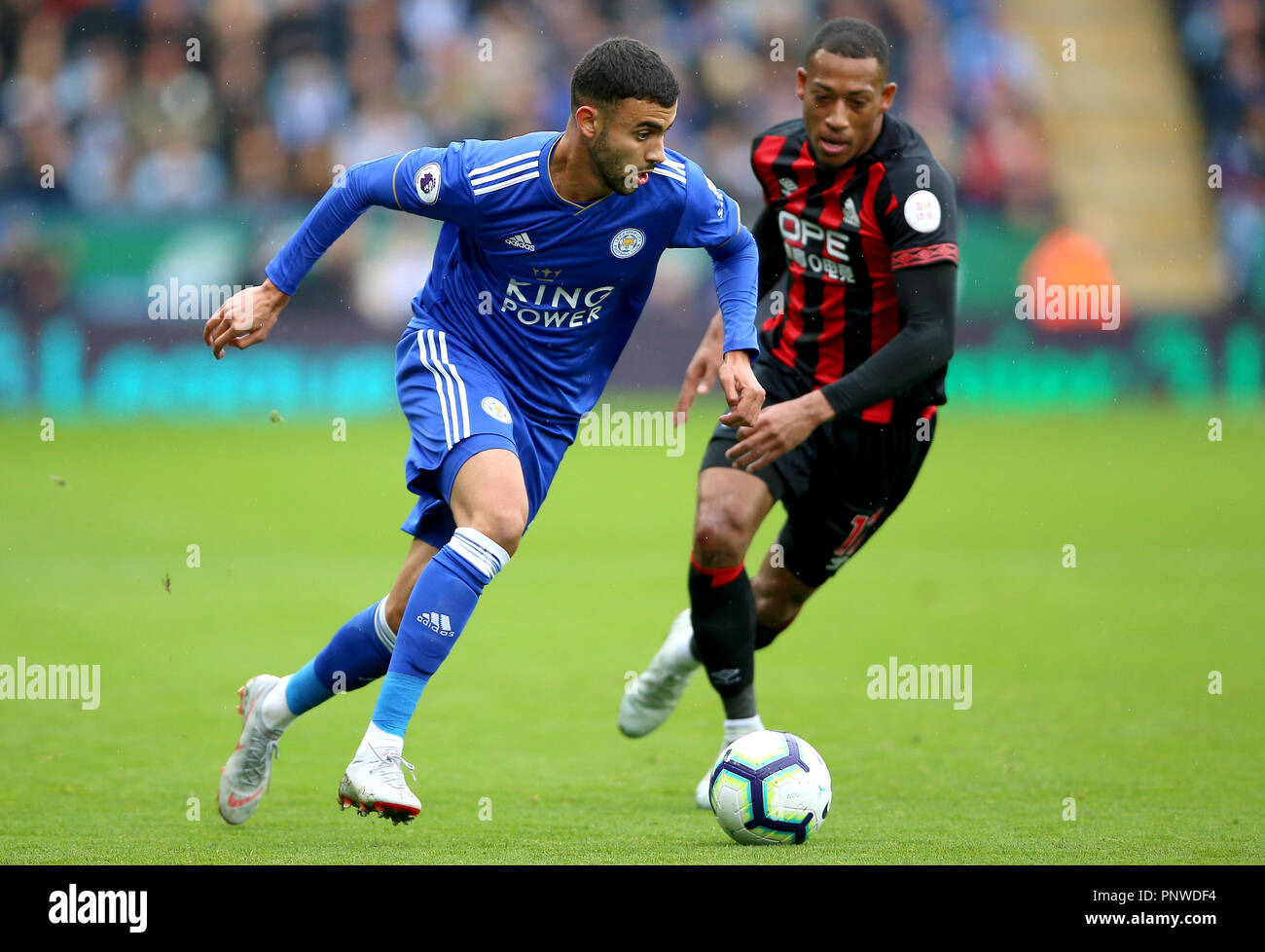 Leicester City S Rachid Ghezzal Left And Huddersfield Town S Rajiv Van La Parra Battle For The Ball During The Premier League Match At The King Power Stadium Leicester Stock Photo Alamy