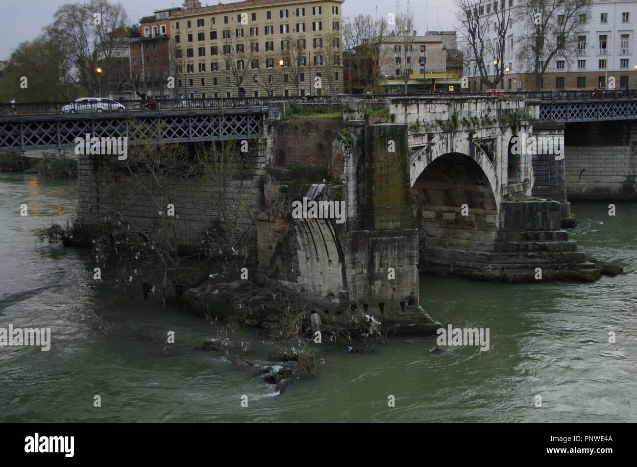 Italy. Rome. Pons Aemilius (Ponte Emilio) or Broken Bridge (Ponte Rotto), 193 B.C. on the River Tiber, the first stone bridge built in Rome. Tiberina Island. Stock Photo