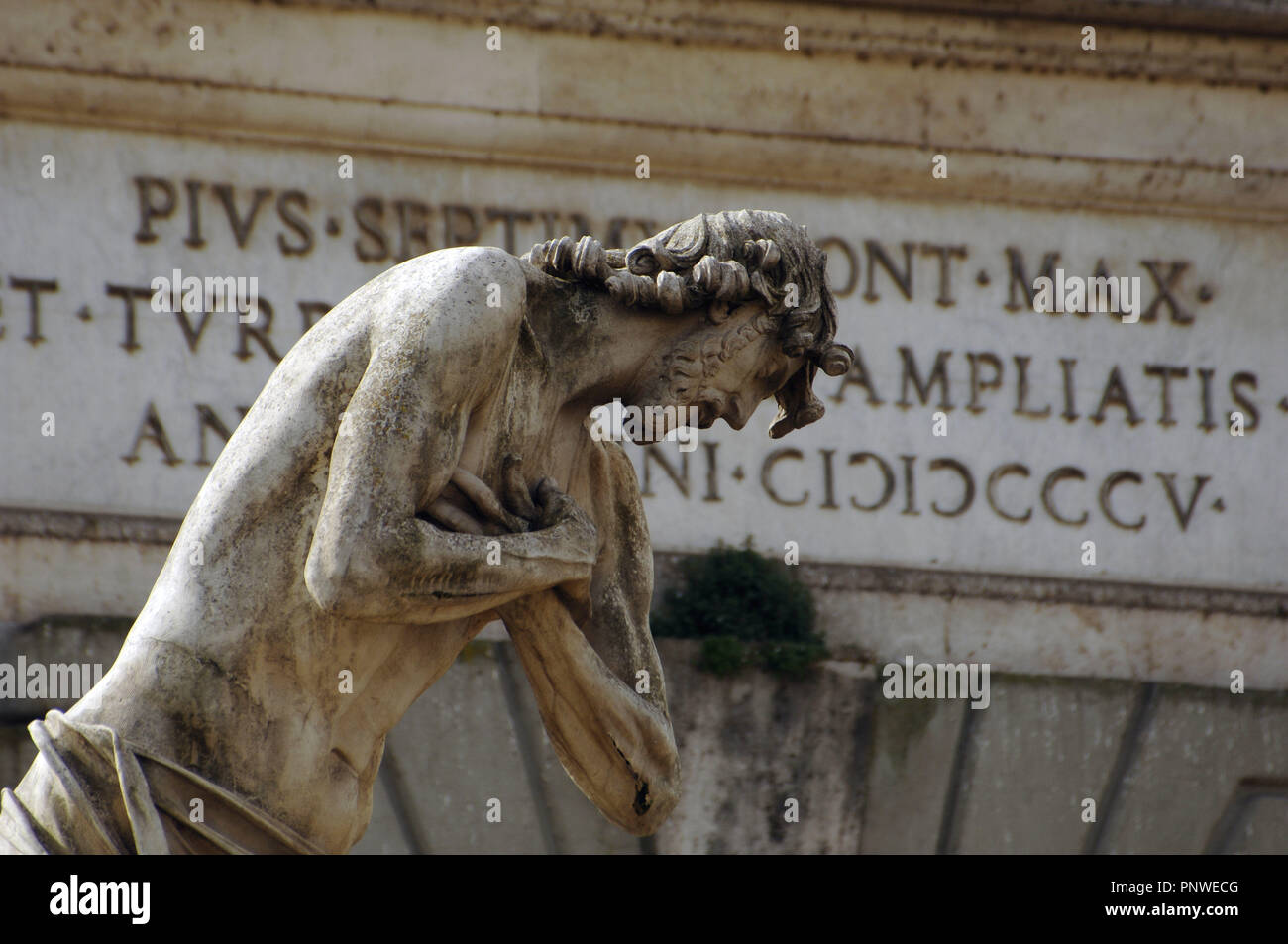Rome. Italy. Milvian bridge over the Tiber riber. Statue decorating the bridge. Stock Photo